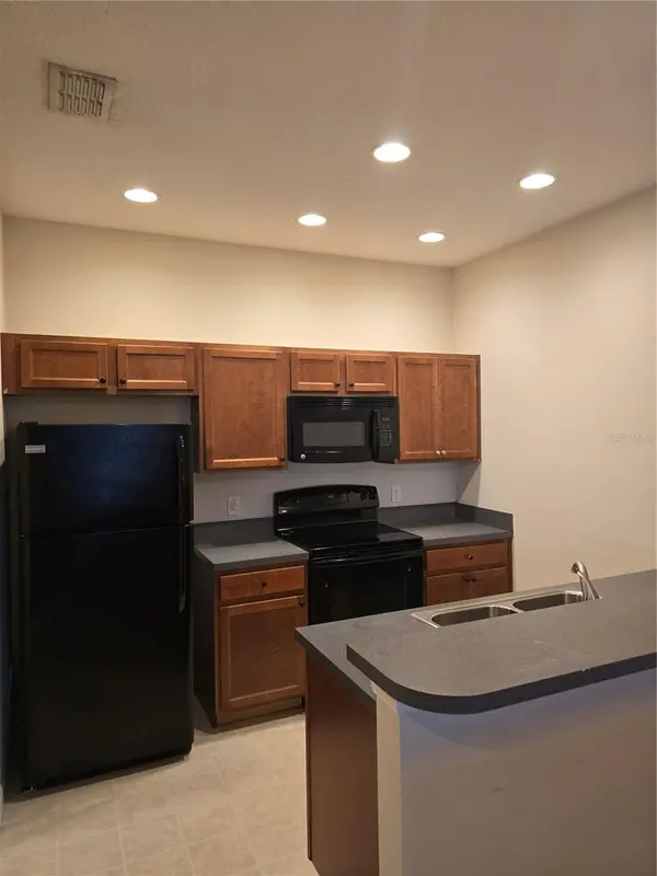 1852 CORIANDER DR, Poinciana, FL 34759