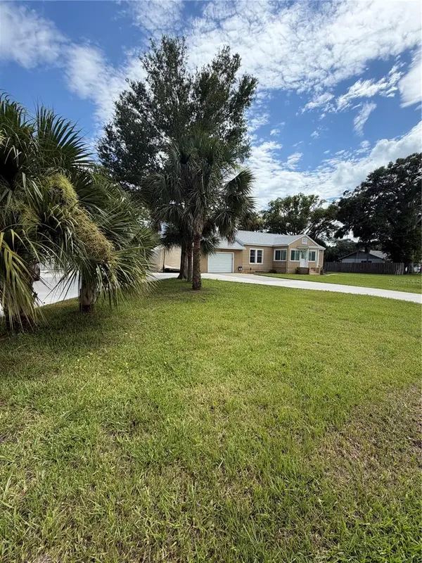 207 E HALIFAX AVE, Oak Hill, FL 32759