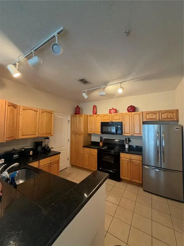 5254 CANE ISLAND LOOP #204, Kissimmee, FL 34746