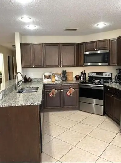 3211 BREWSTER DR, Kissimmee, FL 34743