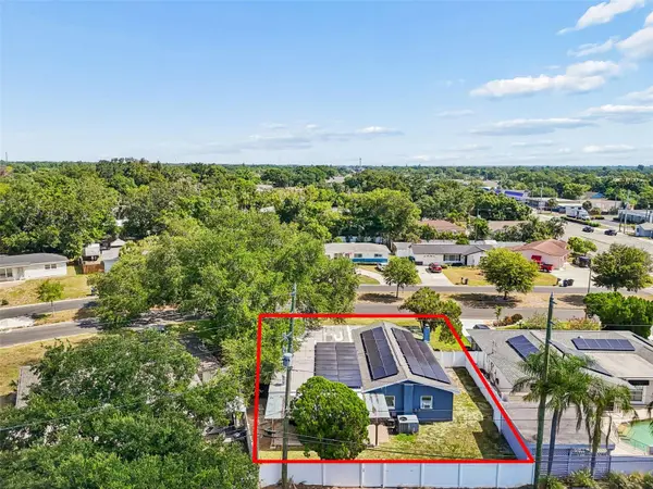 10748 VILLAGE GREEN AVE, Seminole, FL 33772
