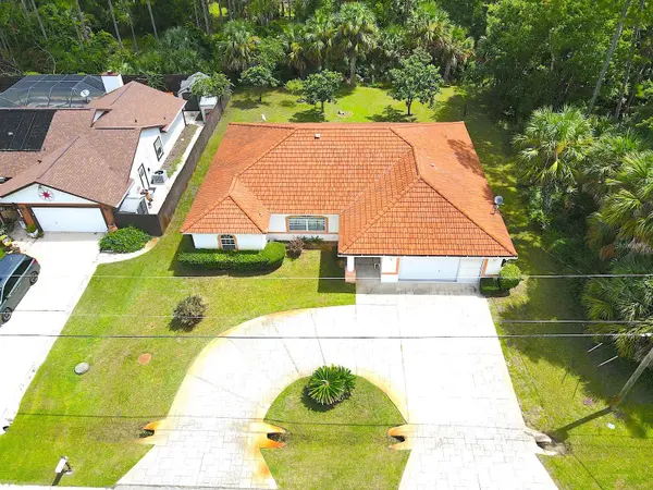 106 POINT OF WOODS DR, Palm Coast, FL 32164