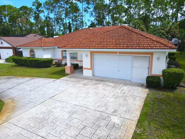 106 POINT OF WOODS DR, Palm Coast, FL 32164