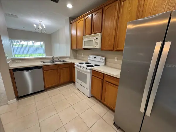 9472 FLOWERING COTTONWOOD RD #77, Orlando, FL 32832
