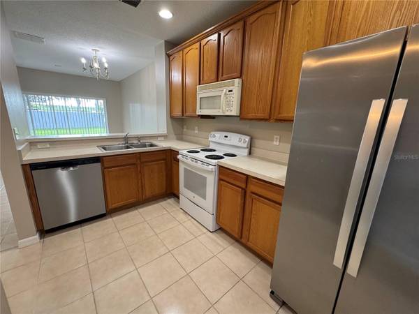 9472 FLOWERING COTTONWOOD RD #77, Orlando, FL 32832