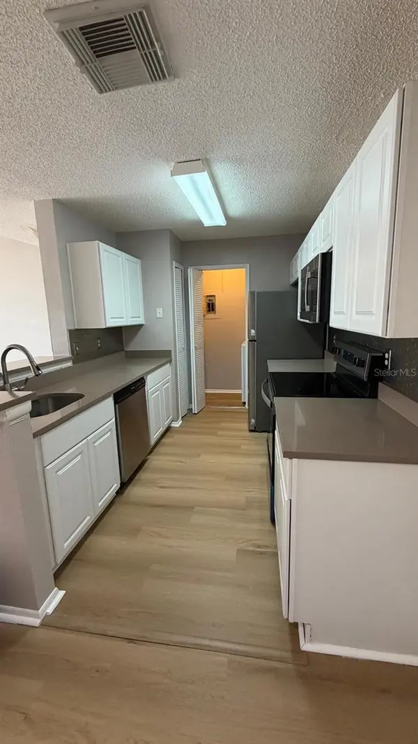 2260 CASCADES BLVD #203, Kissimmee, FL 34741