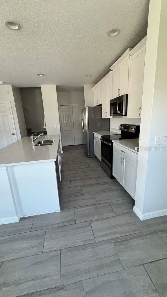 1298 WISPY CYPRESS DR, Kissimmee, FL 34746