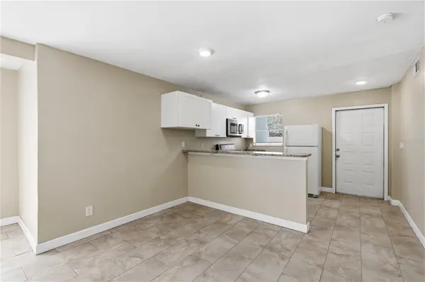 1009 E HOLLAND AVE, Tampa, FL 33612
