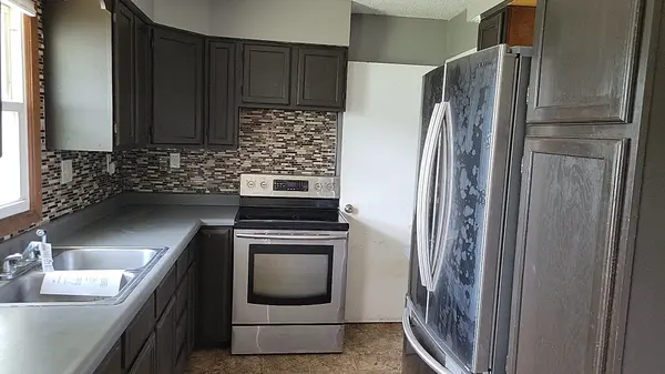 1427 woods AVE, Camanche, IA 52730