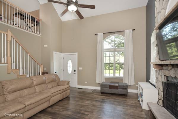 1290 Savanna LN, Woodstock, IL 60098