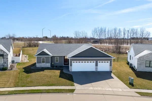 761 Sweet Wood LN, Blue Grass, IA 52726