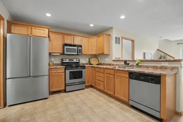 710 Prairie Meadow DR, Blue Grass, IA 52726