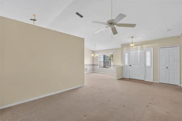 25042 RIVERWALK DR, Leesburg, FL 34748