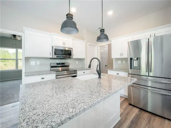 1313 N White Oaks LN, Oak Grove, MO 64075