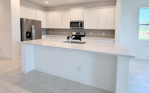 6736 SPOTTED EAGLE LOOP, Howey In The Hills, FL 34737