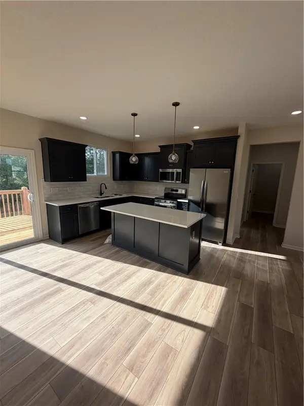 1415 Thomas DR, Louisburg, KS 66053