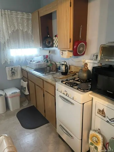 9307 76th ST, Woodhaven, NY 11421