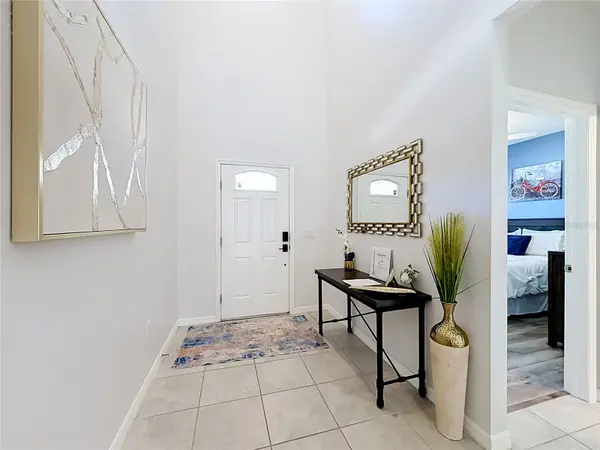 8879 QIN LOOP, Kissimmee, FL 34747