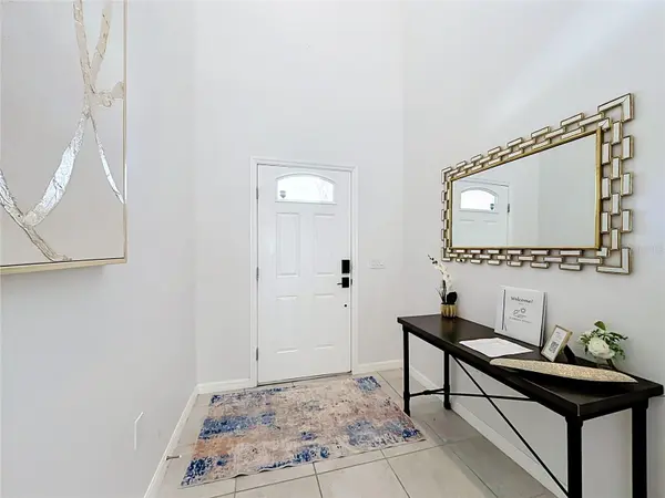 8879 QIN LOOP, Kissimmee, FL 34747