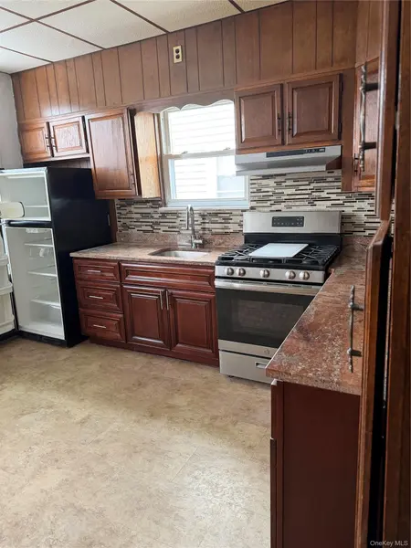 9731 92nd ST, Ozone Park, NY 11416