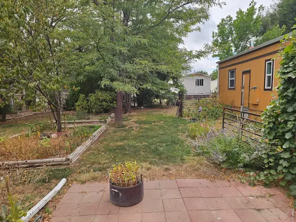 227 Balsam, Log Lane Village, CO 80705