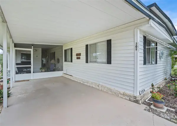 309 SHEERWOOD DR, Lady Lake, FL 32159
