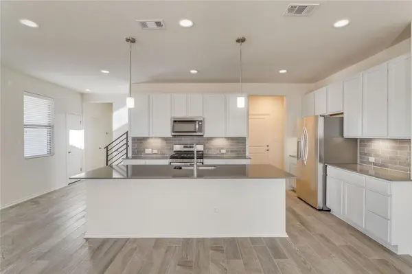 9100 Garnet DR, Austin, TX 78729