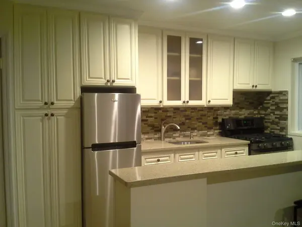 1 Tom’s Point Lane #Unit 15H, Port Washington, NY 11050
