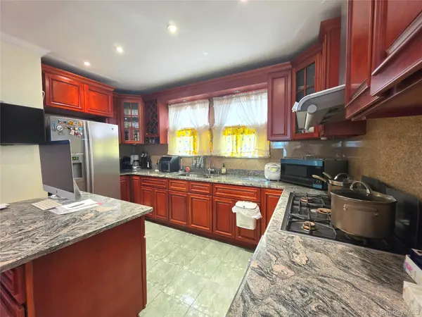 9051 52nd AVE, Elmhurst, NY 11373