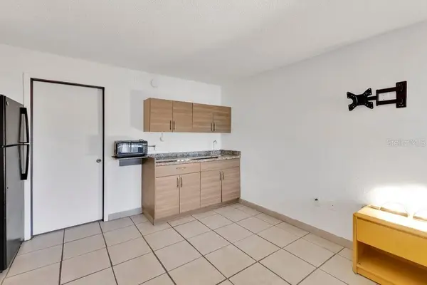 8421 S ORANGE BLOSSOM TRL #420, Orlando, FL 32809