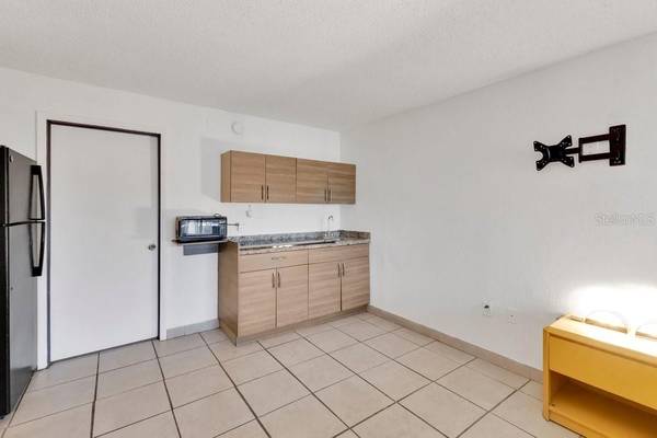 8421 S ORANGE BLOSSOM TRL #420, Orlando, FL 32809