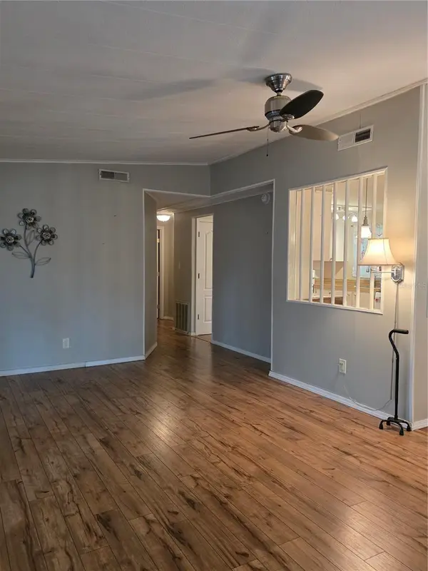 2159 CANOPY CIR #135, Zellwood, FL 32798