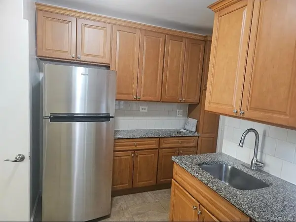 64-11 99 St #301, Rego Park, NY 11374