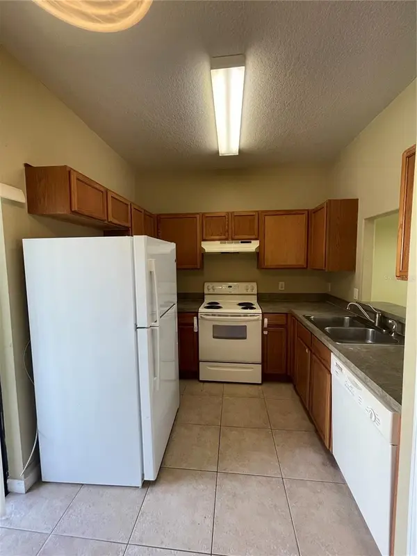 6007 SCOTCHWOOD GLN #32, Orlando, FL 32822