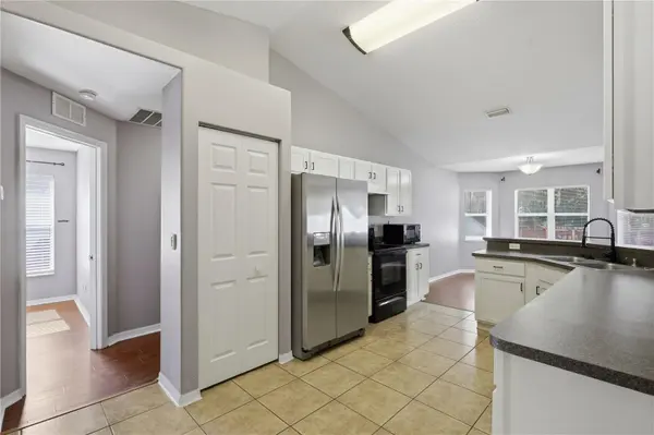 90 ZEPHYR LILY TRL, Palm Coast, FL 32164