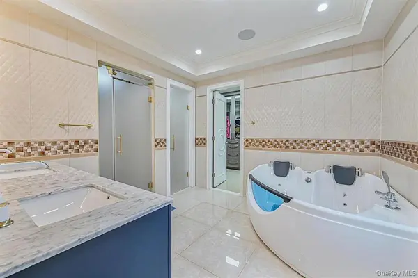 9921 62nd DR, Rego Park, NY 11374
