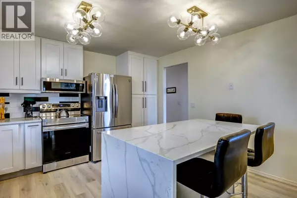 Kelowna, BC V1W3B6,650 Lexington DR #318