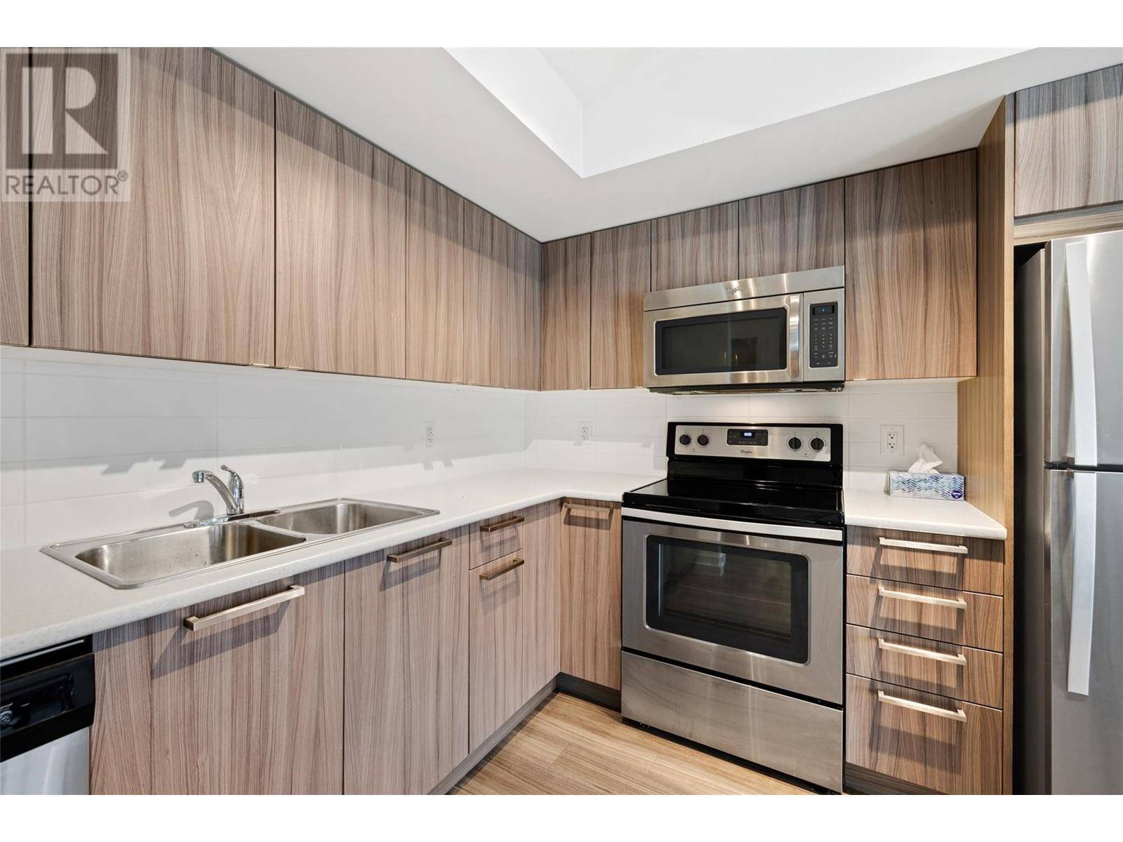 Kelowna, BC V1V0A3,883 Academy WAY #111