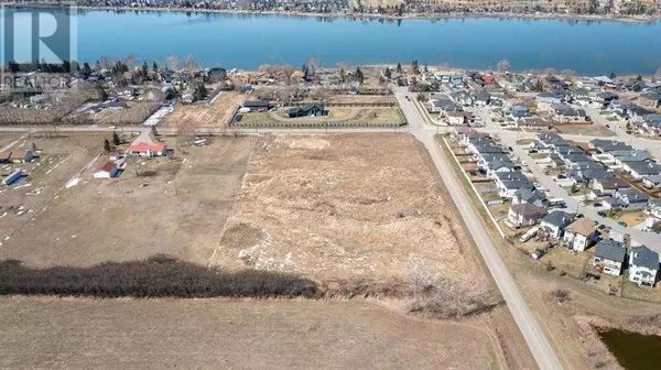 Chestermere, AB T1X1A8,. SE Corner Of East Lakeview Road And East Merganser