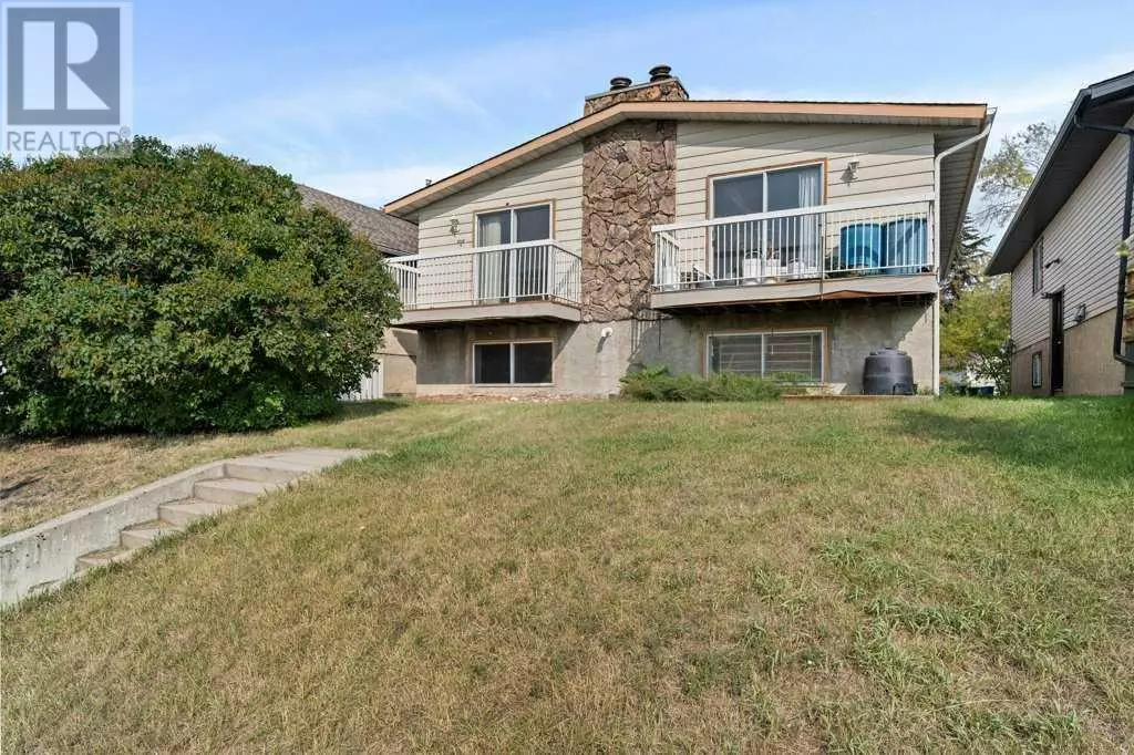 Calgary, AB T3B0G4,7008B Bowness Road NW