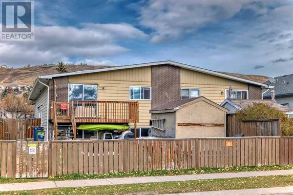 1, 524 1 Street E, Cochrane, AB T4C1C6