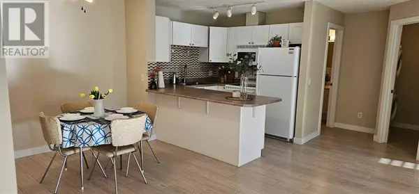 Calgary, AB T3K5J8,305, 9 Country Village Bay NE