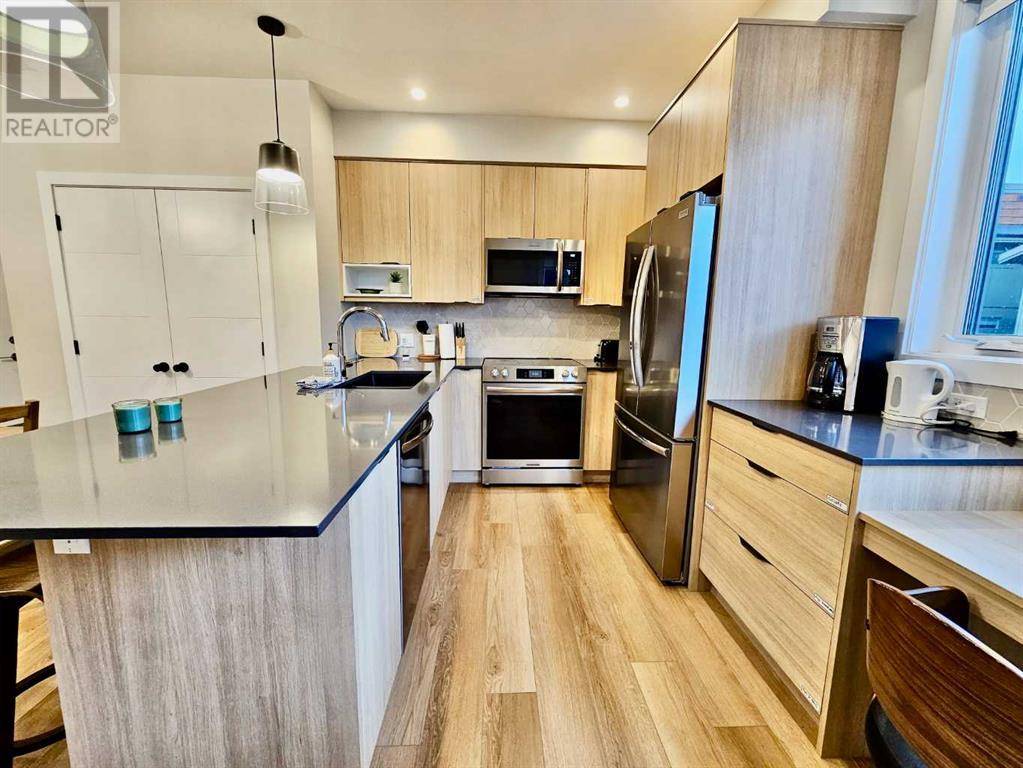 Canmore, AB T1W0G6,202i, 209 Stewart Creek Rise
