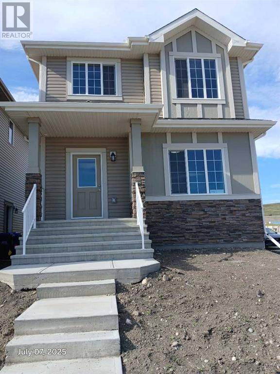 392 Heartland Way, Cochrane, AB T4C3E5