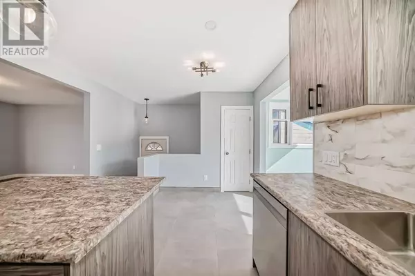 Calgary, AB T2J1K5,9408 5 Street SE