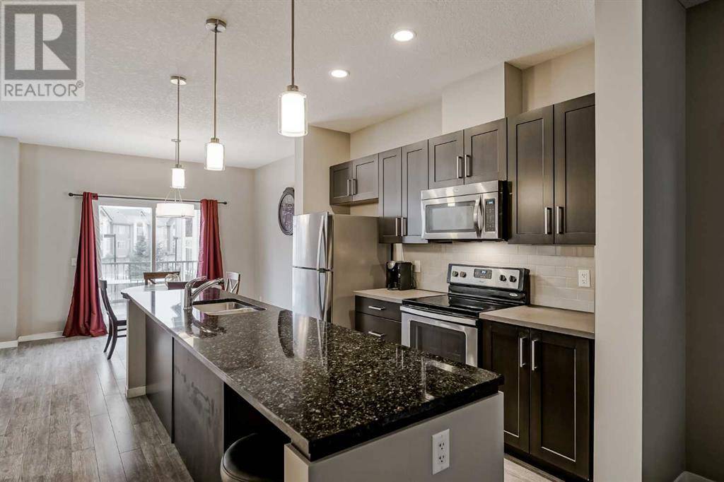 Calgary, AB T2Z5B8,166 Copperpond Villas SE