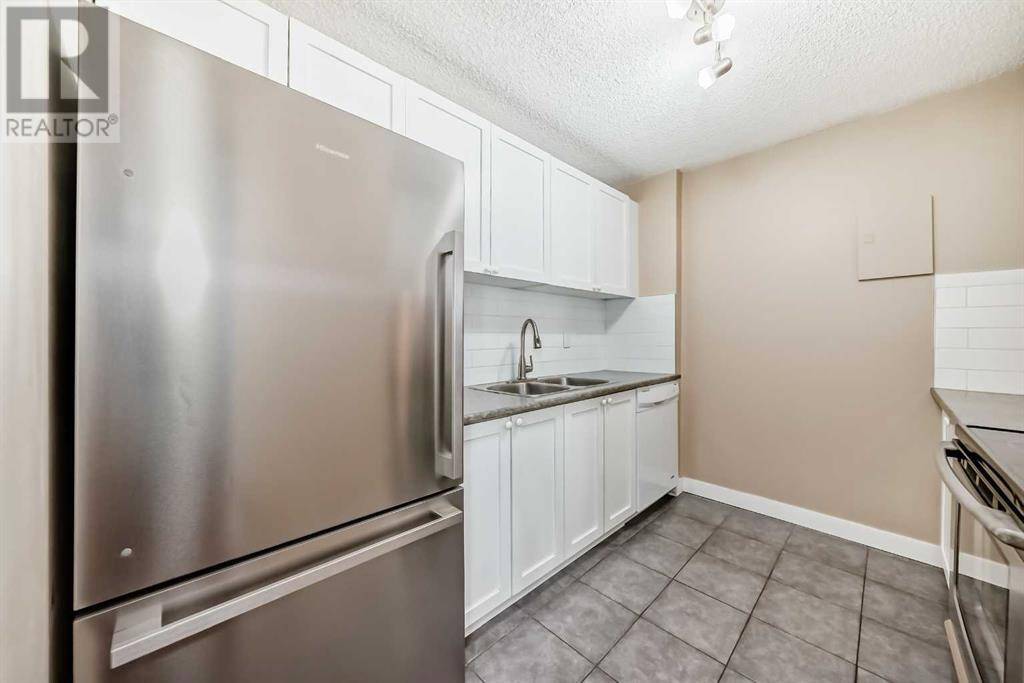 Calgary, AB T3A2E6,202, 4944 Dalton Drive NW
