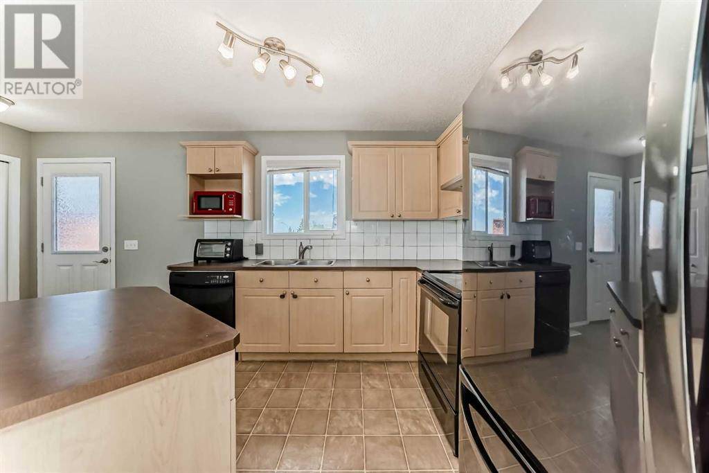 Calgary, AB T2Y5E5,506 Everridge Drive SW