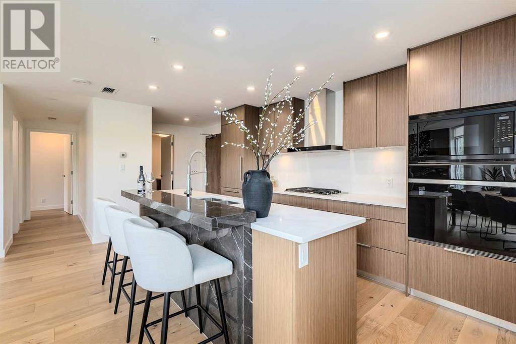 Calgary, AB T2P1K9,202, 128 Waterfront Court SW