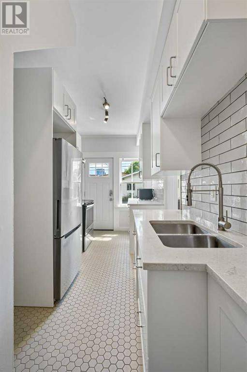 Calgary, AB T2M0C6,219 12 Avenue NW